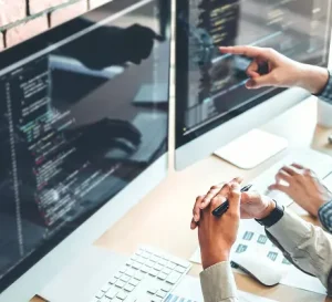 Developer coding custom website using Craft CMS content management system