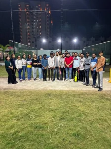 Male cricket players in action during a competitive match on the field