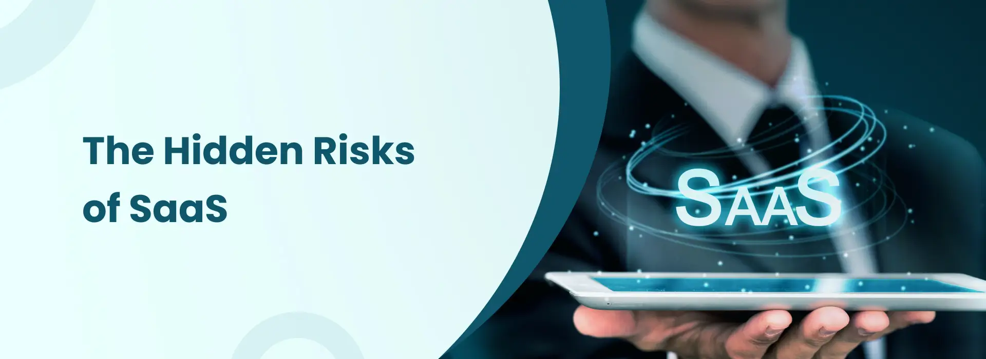 Hidden risks of SaaS platforms shown with a businessman holding a tablet displaying SaaS technology.