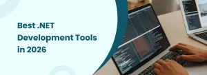 Developer working on laptop showcasing best .NET development tools for 2026